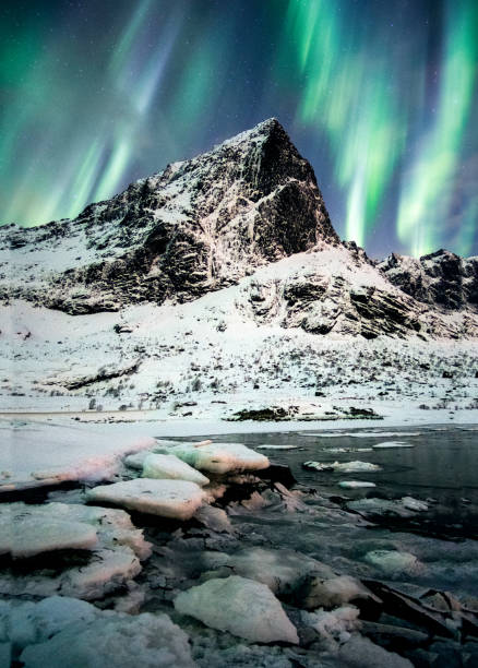 istock Aurora Borealis (Northern lights) explosion over mountains in glacier 991852252