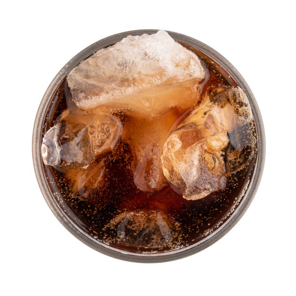 istock Cola in a glass isolated on white background, Top view 991853018
