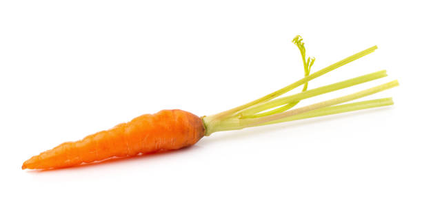 istock Fresh baby carrots isolated on a white background 991853730