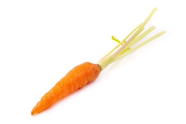 istock Fresh baby carrots isolated on a white background 991854064