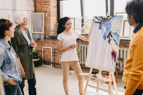Young Woman Presenting Painting