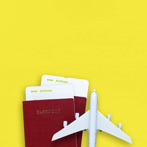 istock Passports, boarding passes and toy airplane 991865208