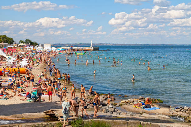 Odessa, Ukraine - July 01 2018: People enjoying the sun at Lanzheron beach.
