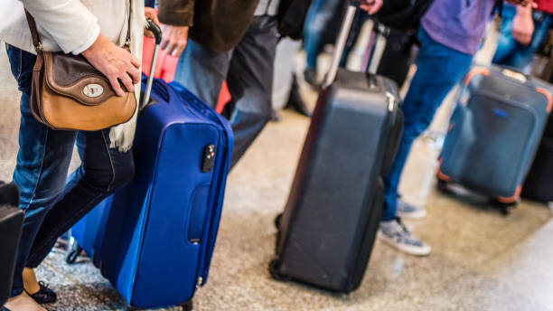 istock Business people at airport 991877528