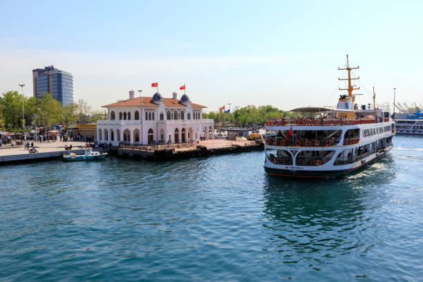 A ferry departs Kadikoy ferry stop in Kadikoy, Istanbul, Turkey on April 27, 2018. Istanbul in Turkey's northwest is the only city on earth spanning two continents. The Bosphorus, a small stretch of water divides Europe from Asia. Istanbul's world famous ferries are one of the most popular ways to get around the city, it is estimated that more than 300,000 people take the ferry to work each day