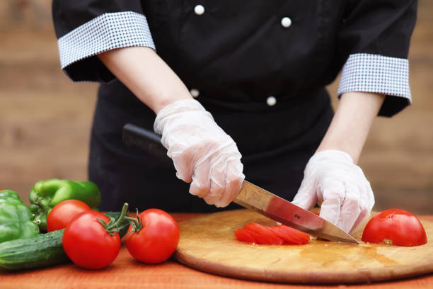 istock The cook cuts fresh farm vegetables 991891330