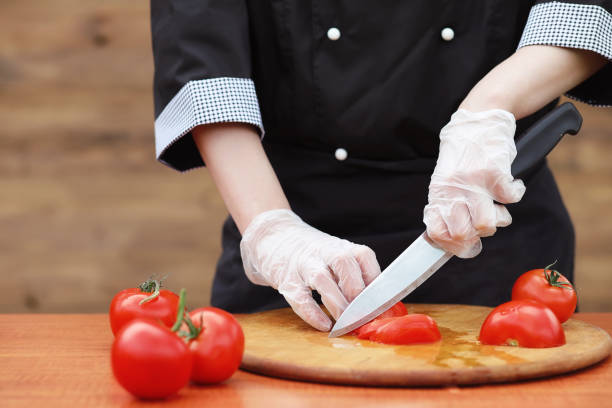 istock The cook cuts fresh farm vegetables 991891476