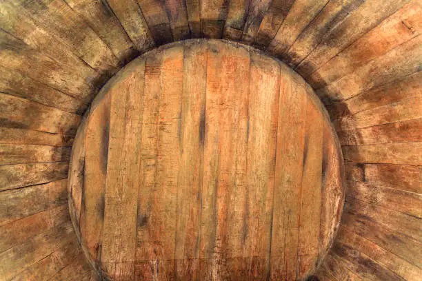 inside an oak barrel, An old wine cellar with oak barrels,barrels for wine in old cellars.Processing in retro style or vintage for design and creativity