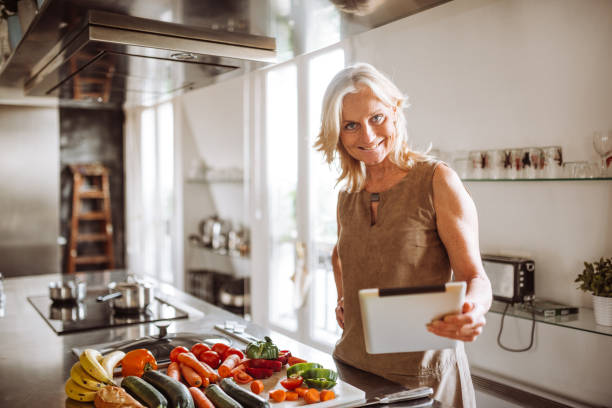 istock woman read the recipe on the tablet 991899788