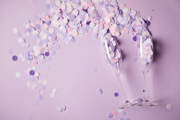 istock top view of confetti pieces and empty glasses on surface 991900186
