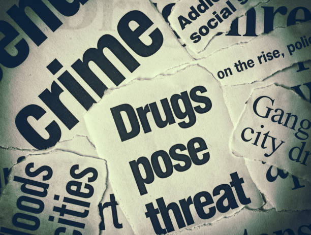 istock Newspaper headlines on crime and drugs 991903314