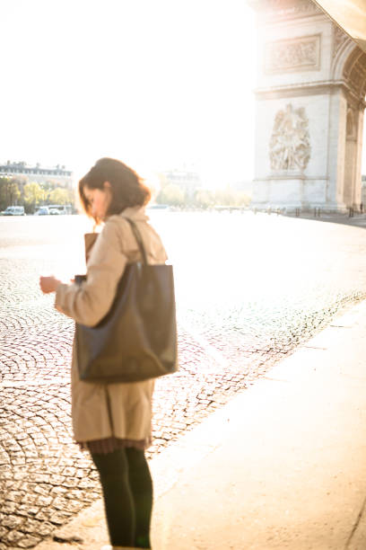 istock pretty woman on the phone in paris 991903478