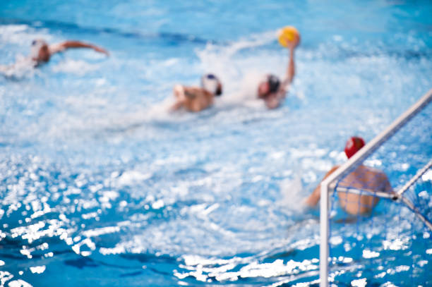 Unfocused image of a water polo match Unfocused image of a water polo match water polo photos stock pictures, royalty-free photos & images