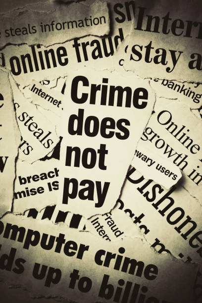 istock Newspaper headlines on computer crime and online fraud 991913226