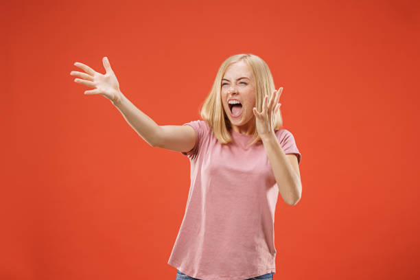 istock Winning success woman happy ecstatic celebrating being a winner. Dynamic energetic image of female model 991914230