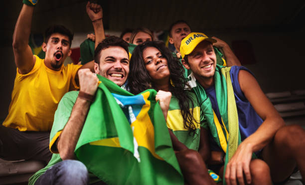 istock brazilian supporters have fun at the stadium 991941122