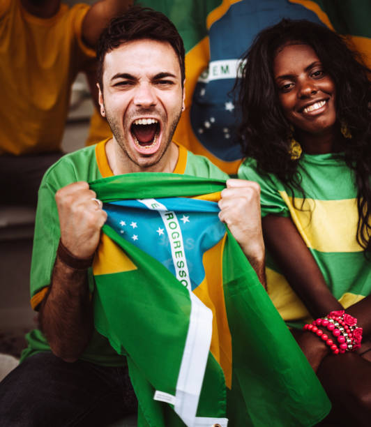 istock brazilian supporters have fun at the stadium 991941228