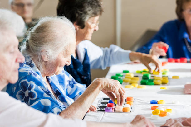 istock Senior women playing multiple bingo cards 991947752