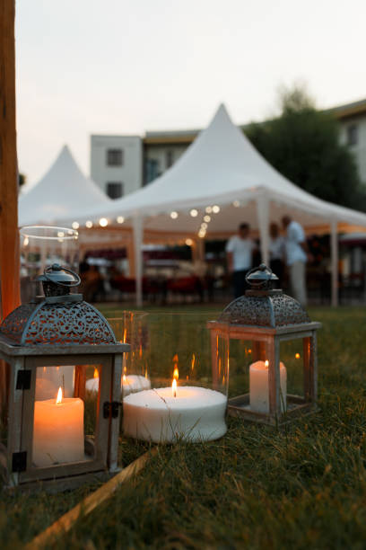 istock many burning candles decorate the resting place 991965126