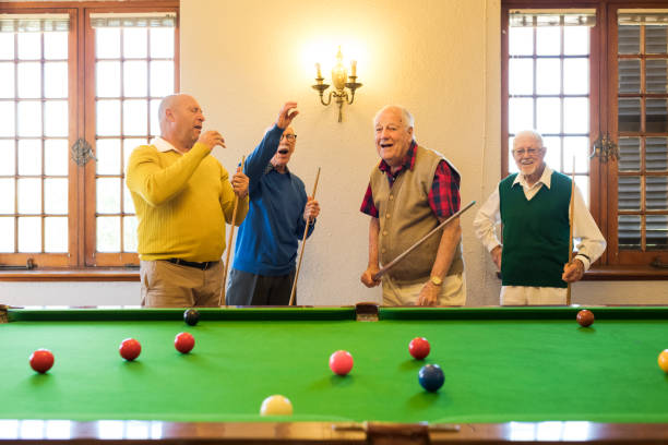 istock Disappointed senior men playing snooker game 991972018
