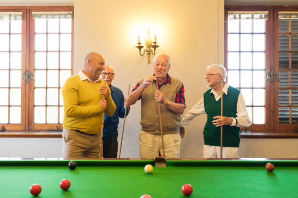 istock Retired senior friends exchanging laughs 991978130