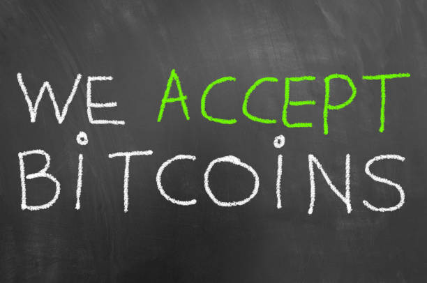 istock We accept bitcoins chalk text written on blackboard or chalkboard 991978638