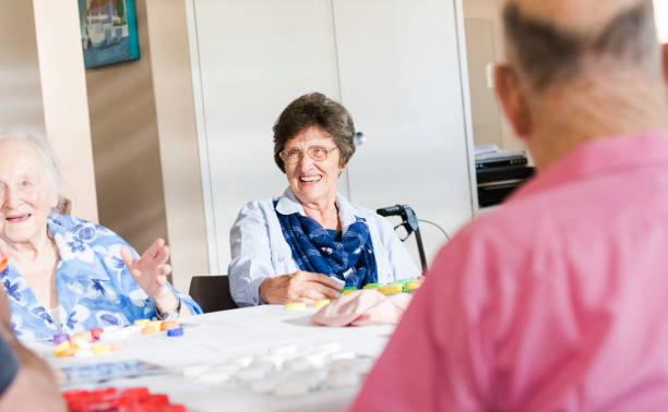 istock Social seniors playing bingo together 991978752
