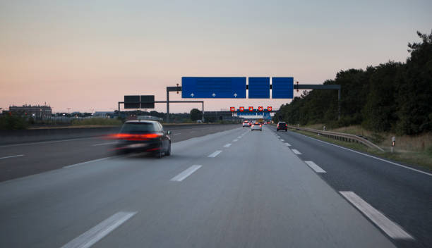 istock Highway at dusk - unrecognisable cars driving 991979874