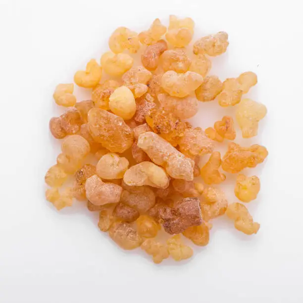 fragrant frankincense on a white acrylic background.