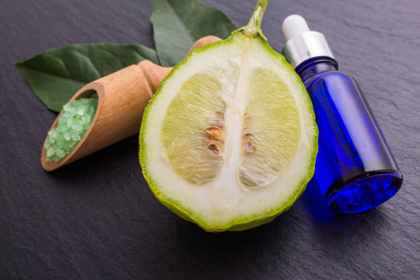 istock Lemon essential oil on a white background 991983900