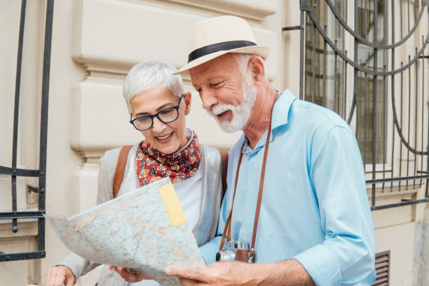 istock Senior married couple looking at the map 991997530