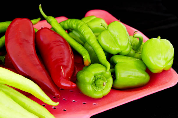 istock red pepper, green pepper, stuffed pepper together. 992008474