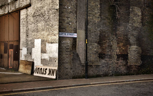 vintage look corner of loftie street in southwark with dirty old brick wall. - corner stone wall brick imagens e fotografias de stock