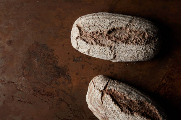 istock elevated view of bread on rusty brown metal tabletop 992016642