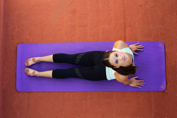 istock Beautiful woman doing exercises 992027784