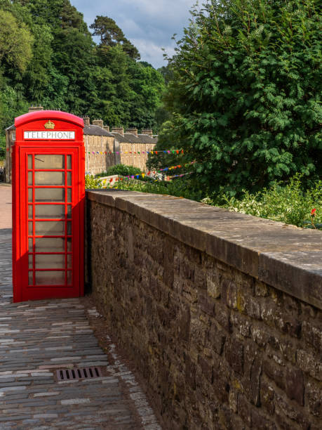 istock Red Phone Box on a cobbled street in Scotland 992028354