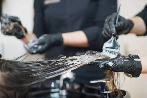 Woman changing hair color