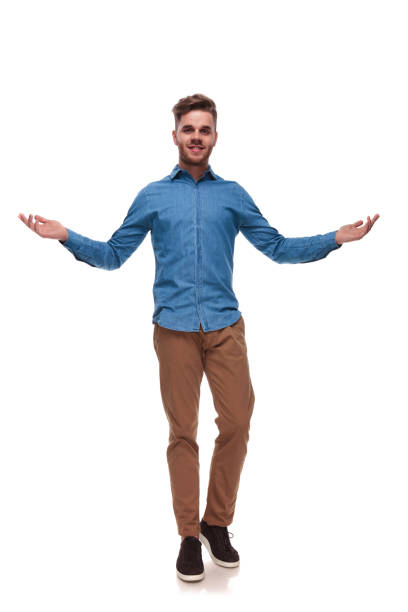 istock welcoming casual man wearing a blue shirt 992033308