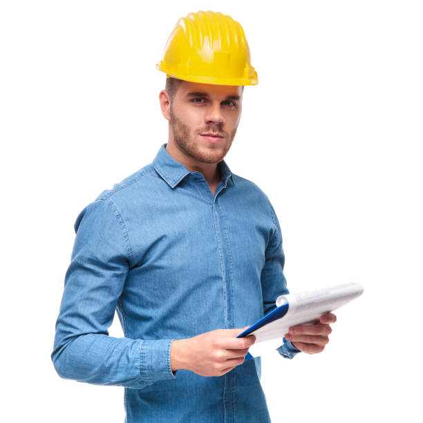 istock portrait of handsome engineer with clipboard in hand 992034474