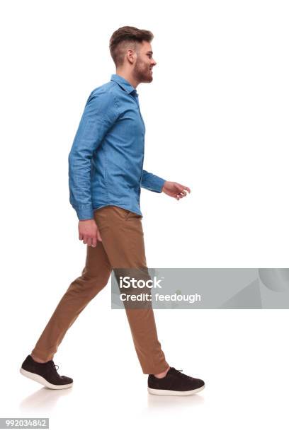 Side View Of Handsome Casual Man Walking Stock Photo - Download Image Now - Walking, Men, Side View