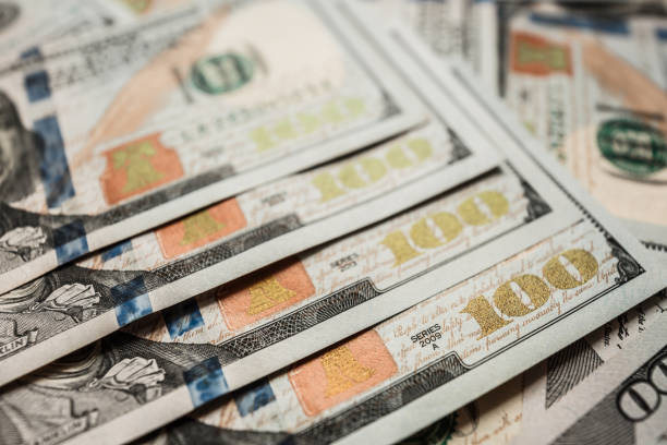 istock One Hundred Dollar Banknotes. Dollars Closeup Concept. 992041994