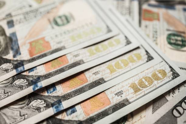 istock One Hundred Dollar Banknotes. Dollars Closeup Concept. 992042008