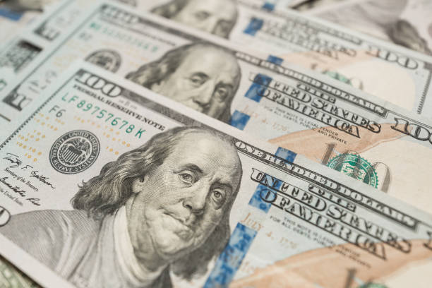 istock One Hundred Dollar Banknotes. Dollars Closeup Concept. 992042186