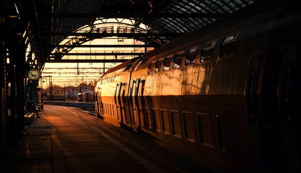 istock Train in sunset in station in Amsterdam 992043188
