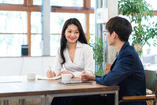 istock Colleagues meeting in a modern office 992045922