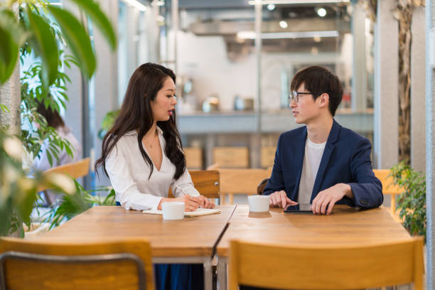 istock Colleagues meeting in a modern office 992045936
