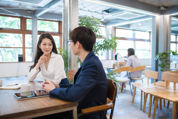 istock Colleagues meeting in a modern office 992045940