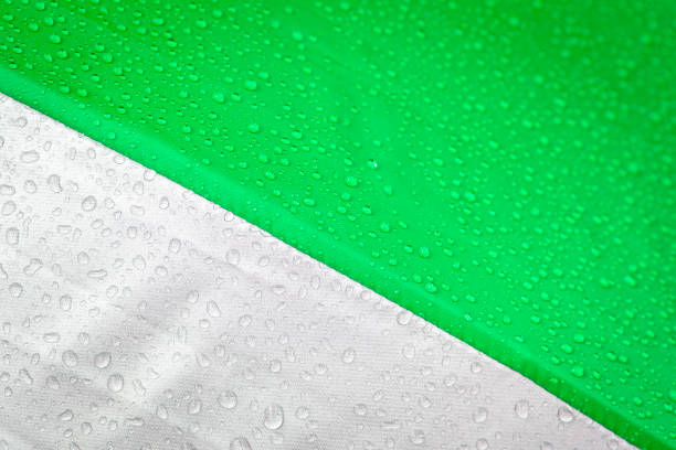 istock Abstract water drop on green and grey background 992052160