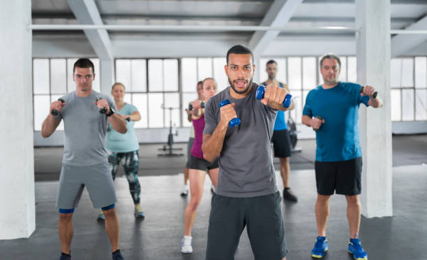 istock People exercising in gym 992052318