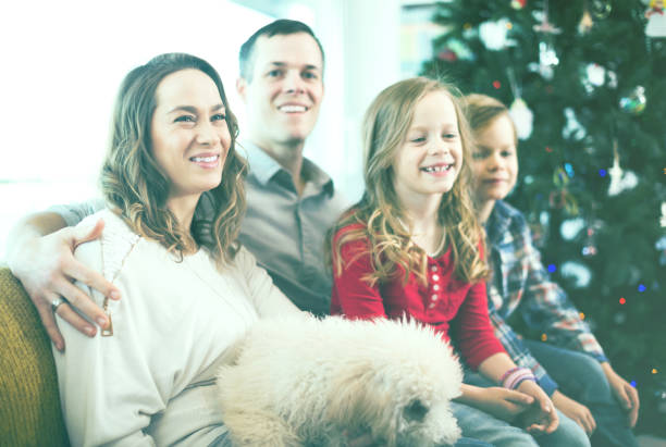istock Family of four spending Christmas time 992053340